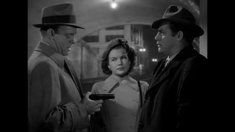 CIRCA 1949 - In this film noir, a couple questions a private eye who they know used to be a gangster.