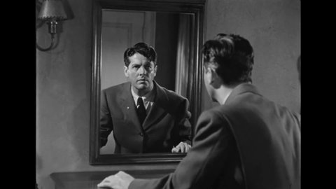 CIRCA 1946 - In this film noir, a man who's been drugged is alarmed to find himself in a strange place.