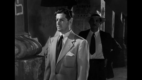 CIRCA 1946 - In this film noir, a Cuban detective tells a suspect that he is always skeptical.