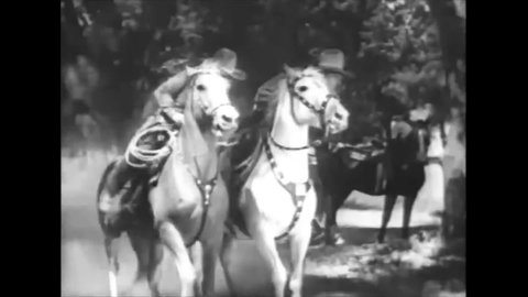 CIRCA 1942 - In this western film, a posse catches a cowboy on horseback and his friends betray him.