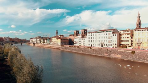 Establishing aerial view of Florence Cathedral, Cattedrale di Santa Maria del Fiore, Ponte Vecchio and The Arno River, Tuscany region of Italy Florence. 4k Footage Italy 