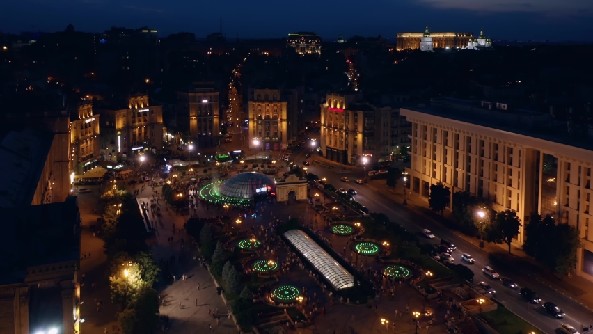 Illuminated Kiev city center square at night.