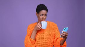 Male woman person drink cacao use device isolated purple color background - Powered by Shutterstock - Get 15% off with code: PIKWIZARD15