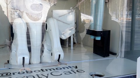 Moscow, Russia, Zaryadye Park, 02.14.2022. Monty's robot. A robotic cafe. MontyCafe coffee shop. High quality 4k footage