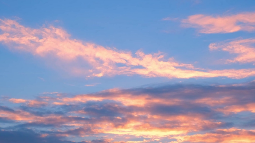 4K UHD : Sky Timelapse, Burning sky and shining, Red purple orange blue pink sunset. Romantic colorful sunset.
