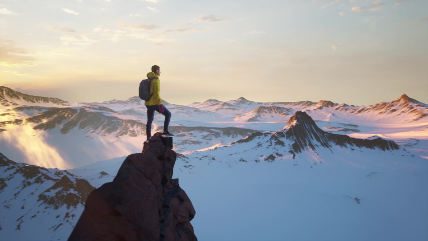 Aerial Around Young Hiker Man Standing on Mountain Peak Summit At Sunset Sunrise Expedition Challenge Drone Epic Adversity Conquering Fear Anxiety Concept CG