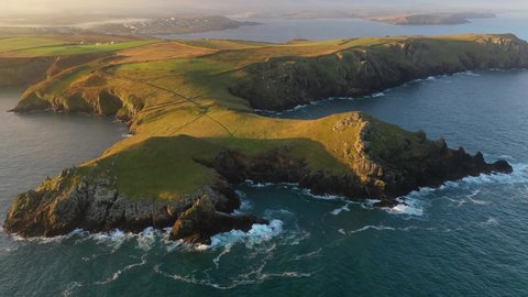 Aerial of The Rumps promontory on the North Cornwall coast near Padstow, Cornwall, England, United Kingdom, Europe