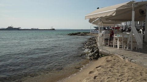 Mykonos Town from restaurant overlooking Agia Anna Beach (Old Port Beach), Mykonos, Cyclades, Greek Islands, Greece, Europe