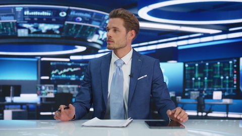 Beginning of TV Live News Program: White Male Presenter Reporting, Talking Charismsmatically, Discussing Daily Events. Television Cable Channel Anchor Talks Politics, Science. Playback Newsroom Studio