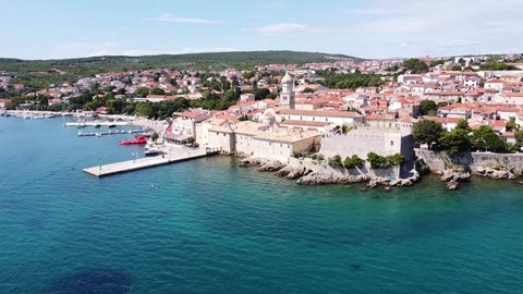Krk Village at Krk Island, Croatia - Aerial Drone View of the Cityscape with Church, Cathedral, City Walls, Port, Boulevard and the Adriatic Sea