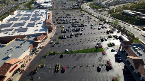 Santa Clarita , United States - 03 25 2022: Aerial Over Santa Clarita Shopping Center Parking Lot And Buildings