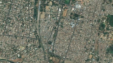 Earth zoom in from space and focus on Tiruchirappalli, Tamil Nadu, India. The animation continues by zoom out through clouds and atmosphere into space. Background for travel intro.