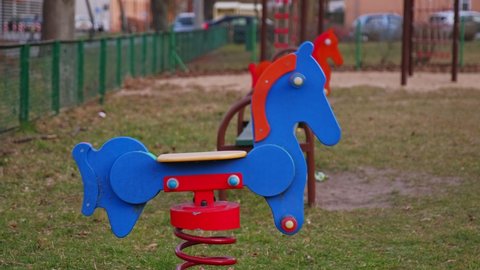 Empty Playground with Spring Swing Horse