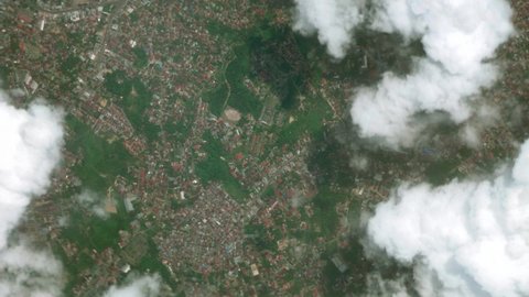 Zoom in to the city of Jambi, Indonesia from space. 3D Animation, Stock video footage.