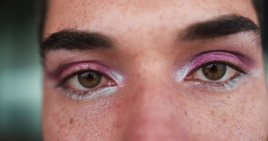 Close up of young transgender man with makeup looking on camera outdoor Royalty-Free Stock Footage #1088969105