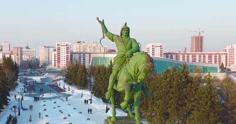 Ufa, Bashkortostan, Russia - January 20 2022: Monument to Salavat Yulaev in Ufa at winter sunny sunset - Aerial drone view