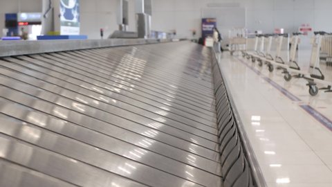 View of airport luggage conveyor belt. empty baggage claim belt.