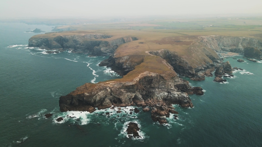 Aerial footage over Land's End, Cornwall Coast South West UK. Drone Footage around the cliffs | Shutterstock HD Video #1088978101