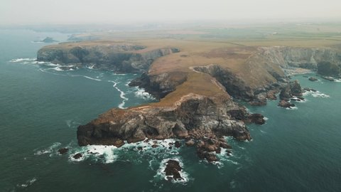 Aerial footage over Land's End, Cornwall Coast South West UK. Drone Footage around the cliffs