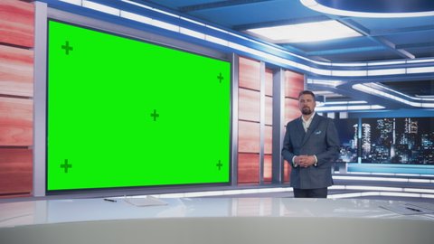 Newsroom TV Studio Live News Program: Caucasian Male Presenter Reporting News, Uses Big Green Screen Chroma Key Screen. Television Cable Channel Anchor Talks. Network Broadcast Mock-up Playback