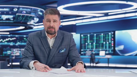 TV Live News Program: Charismatic White Male Presenter Reporting. Television Cable Channel Anchorman or Host Talking about Important Events. Network Broadcast Mock-up Playback. Modern Newsroom Studio
