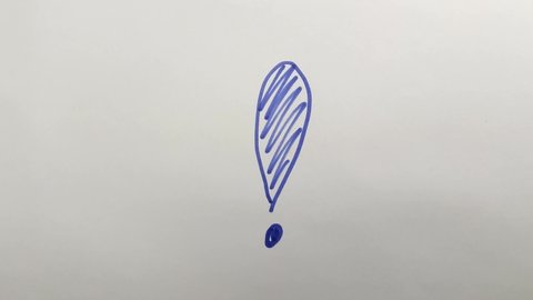 Exclamation mark in blue on a white background. Handwriting exclamation mark. A black felt-tip pen in a woman's hand. Drawing with a marker close-up