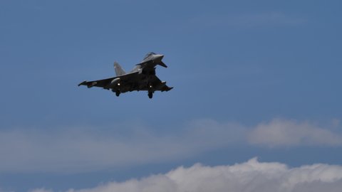 Gran Canaria Spain OCTOBER, 21, 2021 Eurofighter Typhoon of Spanish Air Force landing in blue sky