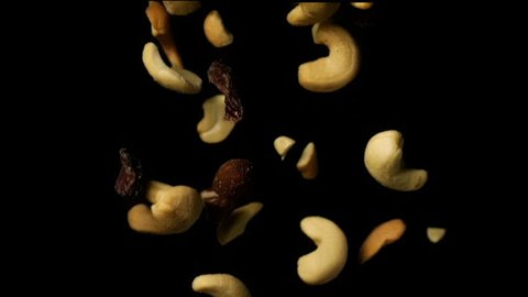 Mixed Nuts Falling In Slow Motion Dark Background 1500fps