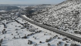 Video taken with drone on snowy road