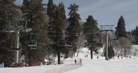 view of the Snow Basin in Ogden in the state of Utah, United States of America. February 2022. North American winter skiing tourists and residents