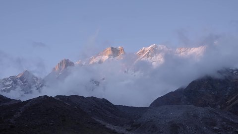 Scenic View Of Kedar Mountains Covered With Clouds During Winter In Garhwal Himalayas, India. Wide Shot