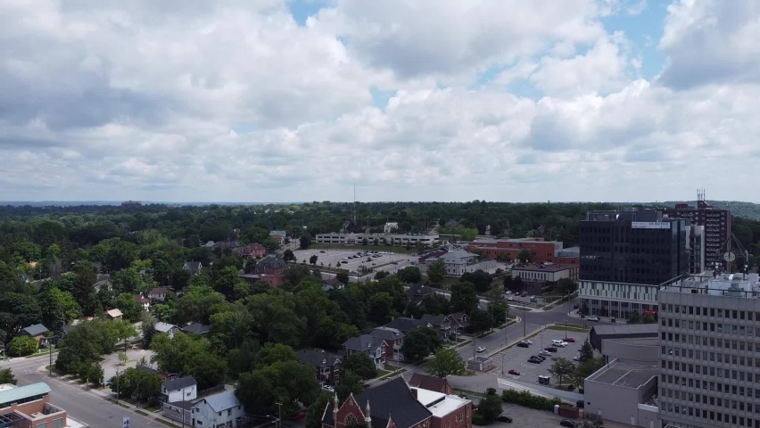 Inner City fly over Public Sector and Town Hall towards Court House Parking Lot during Overcast Day