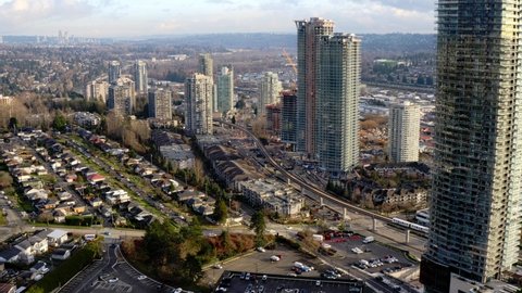 Flying Over Brentwood Town Centre, Shopping Mall In Burnaby, British Columbia, Canada. - aerial