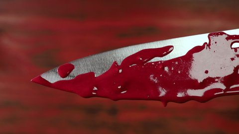 Knife with drops of blood
