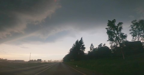 Driving in to a dark storm, 4k Gopro video, view from a car
