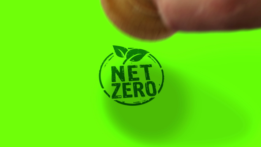 Net zero and eco friendly symbol stamp and hand stamping impact isolated. Co2 neutral, ecology, environment, carbon emissions reduction and green energy 3D rendered concept.  Royalty-Free Stock Footage #1089017259