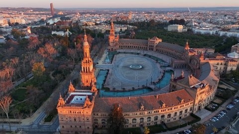 Morning view of Seville city and Plaza de Espana with Maria Luisa Park. Aerial view of Plaza de Espana - Spanish Square - at sunrise in Seville, Spain