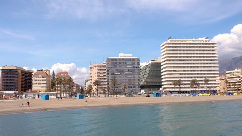 Fuengirola, Spain - March 09 2022: Panoramic view of Fuengirola city. View of promenade area of the city, Los Boliches Beach and San Francisco Beach. Touristic travel destination in Costa del Sol