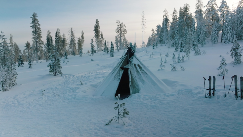 A Hut Covered In Thick Snow In Rovaniemi, Lapland Finland - aerial shot
