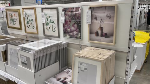 BANGKOK, THAILAND - Circa March, 2022: Photo frame at IKEA Store Bang Yai inside Central Plaza Westgate. Scandinavian style design idea pictures examples in frames. Customers walk in background