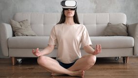 Young woman is exercising at home, meditating in a virtual world by the sea and wearing virtual reality glasses. Woman wearing VR headset glasses.