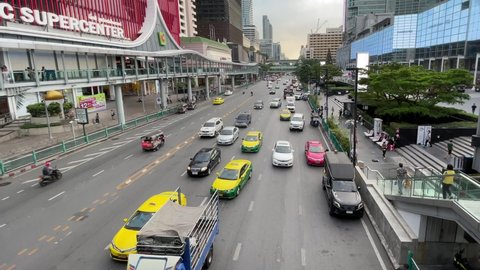BANGKOK, THAILAND - Circa November, 2021: Traffic road at Central World Shopping Plaza Complex, tourist attraction for local and tourist opposite from Big C super center on Ratchadamri Road