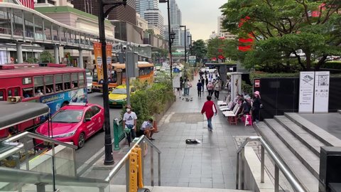BANGKOK, THAILAND - Circa November, 2021: Traffic road at Central World Shopping Plaza Complex, tourist attraction for local and tourist opposite from Big C super center on Ratchadamri Road