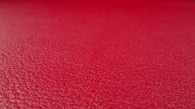 Abstract pattern of wrinkles on red cow leather surface as background macro view. Sewing material for different items crafting. Design and decor - Powered by Shutterstock - Get 15% off with code: PIKWIZARD15