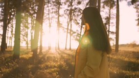 Girl walks through natural forest. Woman hiking alone. Teenager girl in nature at sunset. Fantasy of people in park in autumn. Active lifestyle. People in forest. Tourist walk in autumn forest park - Powered by Shutterstock - Get 15% off with code: PIKWIZARD15