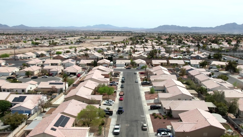 Aerial view of Las Vegas suburban neighborhood houses, Desert in background