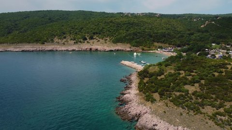 Aerial view of Risika Beach and marina on Krk island in the Mediterranean Sea