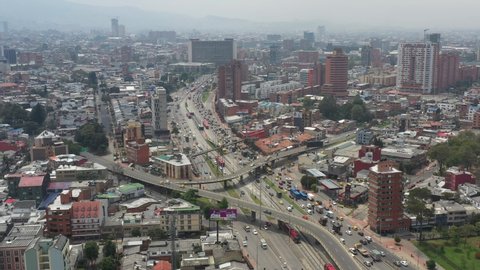 Highway with traffic and elevated bridges in one of the busiest areas of the Colombian capital. Bogotá. Colombia. February 23, 2022. 