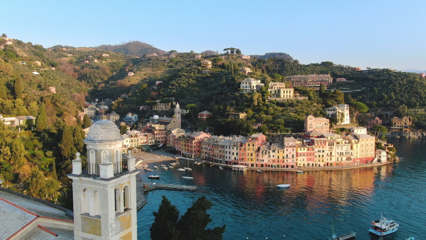 portofino aerial view drone at sunrise of picturesque village in liguria italy,famous italian luxury tourists destination 4k Royalty-Free Stock Footage #1089041557