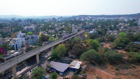 Pune, India - March 27 2022: The newly inaugurated Pune Metro on the Vanaz to Garware College elevated corridor at Pune India.